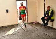 11 May 2024; Steward Liam Barry looks on as Kevin McDonald of Carlow makes his way to the pitch before the Leinster GAA Hurling Senior Championship Round 3 match between Carlow and Kilkenny at Netwatch Cullen Park in Carlow. Photo by Piaras Ó Mídheach/Sportsfile