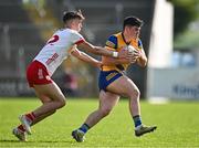 11 May 2024; Daniel Hagney of Roscommon in action against Gavin Potter of Tyrone during the EirGrid GAA All-Ireland Football U20 Championship semi-final match between Roscommon and Tyrone at Kingspan Breffni in Cavan. Photo by Sam Barnes/Sportsfile