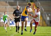 11 May 2024; Niall O'Donnell of Roscommon in action against Michael Rafferty of Tyrone during the EirGrid GAA All-Ireland Football U20 Championship semi-final match between Roscommon and Tyrone at Kingspan Breffni in Cavan. Photo by Sam Barnes/Sportsfile