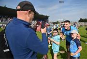11 May 2024; Paddy Smyth of Dublin takes a photo with supporters after the Leinster GAA Hurling Senior Championship Round 3 match between Dublin and Antrim at Parnell Park in Dublin. Photo by Ben McShane/Sportsfile