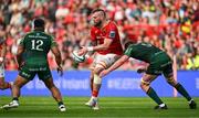 11 May 2024; RG Snyman of Munster in action against Bundee Aki and Oisín Dowling of Connacht during the United Rugby Championship match between Munster and Connacht at Thomond Park in Limerick. Photo by Brendan Moran/Sportsfile