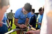 11 May 2024; Eoghan O'Donnell of Dublin signs autographs for supporters after the Leinster GAA Hurling Senior Championship Round 3 match between Dublin and Antrim at Parnell Park in Dublin. Photo by Ben McShane/Sportsfile