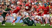 11 May 2024; RG Snyman of Munster is tackled by Conor Oliver and Peter Dooley of Connacht during the United Rugby Championship match between Munster and Connacht at Thomond Park in Limerick. Photo by Brendan Moran/Sportsfile