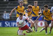 11 May 2024; Eoin McElholm of Tyrone in action against Cillian Campbell of Roscommon during the EirGrid GAA All-Ireland Football U20 Championship semi-final match between Roscommon and Tyrone at Kingspan Breffni in Cavan. Photo by Sam Barnes/Sportsfile