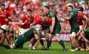 11 May 2024; RG Snyman of Munster is tackled by Joe Joyce and Peter Dooley of Connacht during the United Rugby Championship match between Munster and Connacht at Thomond Park in Limerick. Photo by Brendan Moran/Sportsfile
