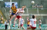 11 May 2024; Cormac Devlin of Tyrone in action against Conor Harley of Roscommon during the EirGrid GAA All-Ireland Football U20 Championship semi-final match between Roscommon and Tyrone at Kingspan Breffni in Cavan. Photo by Sam Barnes/Sportsfile