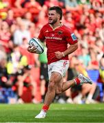 11 May 2024; Alex Nankivell of Munster races clear on the way to scoring his side's third try during the United Rugby Championship match between Munster and Connacht at Thomond Park in Limerick. Photo by Brendan Moran/Sportsfile