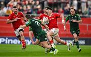 11 May 2024; Calvin Nash of Munster makes a break during the United Rugby Championship match between Munster and Connacht at Thomond Park in Limerick. Photo by Brendan Moran/Sportsfile