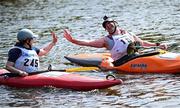 11 May 2024; Fatima Gunning, left, and Ciarán Usher congratulate each other after finishing The 63rd International Liffey Descent at Garda Boat Club in Dublin. Photo by Seb Daly/Sportsfile
