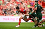 11 May 2024; Joey Carbery of Munster on the way to scoring his side's fifth try despite the tackle of Caolin Blade of Connacht during the United Rugby Championship match between Munster and Connacht at Thomond Park in Limerick. Photo by Brendan Moran/Sportsfile