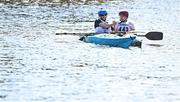 11 May 2024; Rory Macpherson and John Edwards congratluate each other after finishing The 63rd International Liffey Descent at Garda Boat Club in Dublin. Photo by Seb Daly/Sportsfile