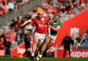 11 May 2024; Shane Barrett of Cork in action against Seán Finn of Limerick during the Munster GAA Hurling Senior Championship Round 3 match between Cork and Limerick at SuperValu Páirc Ui Chaoimh in Cork. Photo by Daire Brennan/Sportsfile