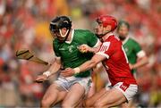 11 May 2024; Declan Hannon of Limerick in action against Alan Connolly of Cork during the Munster GAA Hurling Senior Championship Round 3 match between Cork and Limerick at SuperValu Páirc Ui Chaoimh in Cork. Photo by Daire Brennan/Sportsfile
