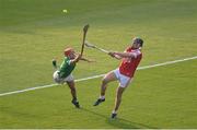 11 May 2024; Darragh Fitzgibbon of Cork in action against Barry Nash of Limerick during the Munster GAA Hurling Senior Championship Round 3 match between Cork and Limerick at SuperValu Páirc Ui Chaoimh in Cork. Photo by Stephen McCarthy/Sportsfile