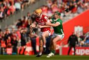 11 May 2024; Shane Barrett of Cork in action against Seán Finn of Limerick during the Munster GAA Hurling Senior Championship Round 3 match between Cork and Limerick at SuperValu Páirc Ui Chaoimh in Cork. Photo by Daire Brennan/Sportsfile