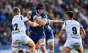 11 May 2024; Ryan Baird of Leinster is tackled by Kieran Williams, left, and Reuben Morgan-Williams of Ospreys during the United Rugby Championship match between Leinster and Ospreys at the RDS Arena in Dublin. Photo by Ramsey Cardy/Sportsfile