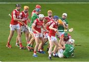 11 May 2024; Players from both side's tussel during the Munster GAA Hurling Senior Championship Round 3 match between Cork and Limerick at SuperValu Páirc Ui Chaoimh in Cork. Photo by Stephen McCarthy/Sportsfile