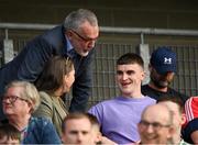 11 May 2024; Larry McCarthy with Kerry footballer Sean O'Shea during the Munster GAA Hurling Senior Championship Round 3 match between Cork and Limerick at SuperValu Páirc Ui Chaoimh in Cork. Photo by Stephen McCarthy/Sportsfile