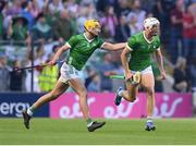 11 May 2024; Kyle Hayes of Limerick celebrates after scoring a point with team-mate Cathal O'Neill, left, during the Munster GAA Hurling Senior Championship Round 3 match between Cork and Limerick at SuperValu Páirc Ui Chaoimh in Cork. Photo by Stephen McCarthy/Sportsfile