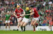 11 May 2024; Séamus Flanagan of Limerick in action against Robert Downey of Cork during the Munster GAA Hurling Senior Championship Round 3 match between Cork and Limerick at SuperValu Páirc Ui Chaoimh in Cork. Photo by Daire Brennan/Sportsfile