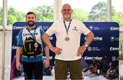11 May 2024; Winner Richard Hobson, right, and second place Scott Templeton at the prize-giving ceremony for the Open Canoe Single class after The 63rd International Liffey Descent at Garda Boat Club in Dublin. Photo by Seb Daly/Sportsfile
