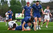 11 May 2024; Jordan Larmour of Leinster celebrates with teammate Jack Conan, top, after scoring their side's fifth try during the United Rugby Championship match between Leinster and Ospreys at the RDS Arena in Dublin. Photo by Ben McShane/Sportsfile