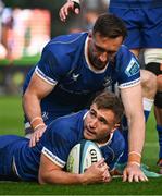 11 May 2024; Jordan Larmour of Leinster celebrates with teammate Jack Conan, top, after scoring their side's fifth try during the United Rugby Championship match between Leinster and Ospreys at the RDS Arena in Dublin. Photo by Ben McShane/Sportsfile