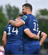 11 May 2024; Jordan Larmour, left, is congratulated by Leinster teammate Robbie Henshaw after scoring their side's fifth try during the United Rugby Championship match between Leinster and Ospreys at the RDS Arena in Dublin. Photo by Ben McShane/Sportsfile