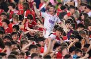 11 May 2024; Cork supporters celebrate on the pitch after the Munster GAA Hurling Senior Championship Round 3 match between Cork and Limerick at SuperValu Páirc Ui Chaoimh in Cork. Photo by Stephen McCarthy/Sportsfile