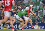 11 May 2024; Shane Kingston of Cork is fouled by Kyle Hayes of Limerick, resulting in a penalty being awarded to Cork late in the Munster GAA Hurling Senior Championship Round 3 match between Cork and Limerick at SuperValu Páirc Ui Chaoimh in Cork. Photo by Stephen McCarthy/Sportsfile