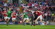 11 May 2024; Adam English of Limerick in action against Robert Downey of Cork during the Munster GAA Hurling Senior Championship Round 3 match between Cork and Limerick at SuperValu Páirc Ui Chaoimh in Cork. Photo by Daire Brennan/Sportsfile