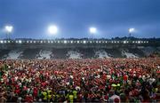 11 May 2024; Cork supporters celebrate on the pitch after the Munster GAA Hurling Senior Championship Round 3 match between Cork and Limerick at SuperValu Páirc Ui Chaoimh in Cork. Photo by Stephen McCarthy/Sportsfile