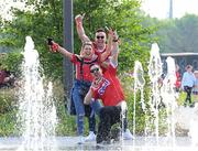 11 May 2024; Cork supporters on their way to the Munster GAA Hurling Senior Championship Round 3 match between Cork and Limerick at SuperValu Páirc Ui Chaoimh in Cork. Photo by Stephen McCarthy/Sportsfile