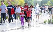 11 May 2024; Supporters at a water feature on their way to the Munster GAA Hurling Senior Championship Round 3 match between Cork and Limerick at SuperValu Páirc Ui Chaoimh in Cork. Photo by Stephen McCarthy/Sportsfile