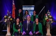 11 May 2024; Winners of the Ceol Uirlise competition, The CLG Chlann na nGael team, including Andrew Collins, Molly McQueen, Davina Connolly and Saoirse Connolly, representing Cork and Munster with Cathaoirleach Choiste Náisiúnta Scór Paula Magee and Uachtarán Chumann Lúthchleas Gael Jarlath Burns during the Scór Sinsear 2024 All-Ireland Finals at the INEC Arena in Killarney, Kerry. Photo by Shauna Clinton/Sportsfile