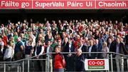 11 May 2024; Patrons, including An Taoiseach Simon Harris TD stand for the playing of the National Anthem before the Munster GAA Hurling Senior Championship Round 3 match between Cork and Limerick at SuperValu Páirc Ui Chaoimh in Cork. Photo by Stephen McCarthy/Sportsfile
