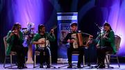 11 May 2024; The CLG Chlann na nGael team, including Andrew Collins, Molly McQueen, Davina Connolly and Saoirse Connolly, representing Cork and Munster in the Ceol Uirlise competition during the Scór Sinsear 2024 All-Ireland Finals at the INEC Arena in Killarney, Kerry. Photo by Shauna Clinton/Sportsfile