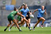 12 May 2024; Jennifer Dunne of Dublin is tackled by Máire O'Shaughnessy of Meath during the Leinster LGFA Senior Football Championship final match between Dublin and Meath at Croke Park in Dublin. Photo by Ben McShane/Sportsfile