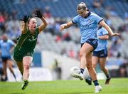 12 May 2024; Jennifer Dunne of Dublin in action against Aoibhín Cleary of Meath during the Leinster LGFA Senior Football Championship final match between Dublin and Meath at Croke Park in Dublin. Photo by Harry Murphy/Sportsfile