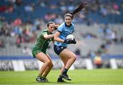 12 May 2024; Olwen Carey of Dublin in action against Kerrie Cole of Meath during the Leinster LGFA Senior Football Championship final match between Dublin and Meath at Croke Park in Dublin. Photo by Harry Murphy/Sportsfile