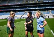 12 May 2024; Referee Marion Hayden tosses the coin watched by captains Monica McGuirk of Meath and Carla Rowe of Dublin before the Leinster LGFA Senior Football Championship final match between Dublin and Meath at Croke Park in Dublin. Photo by Harry Murphy/Sportsfile