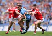 12 May 2024; Niall Scully of Dublin is tackled by Bevan Duffy, left, and Ciaran Downey of Louth during the Leinster GAA Football Senior Championship final match between Dublin and Louth at Croke Park in Dublin. Photo by Ben McShane/Sportsfile
