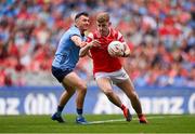 12 May 2024; Peter Lynch of Louth in action against Colm Basquel of Dublin during the Leinster GAA Football Senior Championship final match between Dublin and Louth at Croke Park in Dublin. Photo by Ben McShane/Sportsfile