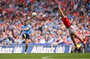 12 May 2024; Con O'Callaghan of Dublin kicks despite Bevan Duffy of Louth during the Leinster GAA Football Senior Championship final match between Dublin and Louth at Croke Park in Dublin. Photo by Ben McShane/Sportsfile