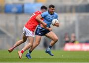 12 May 2024; Colm Basquel of Dublin is tackled by Craig Lennon of Louth during the Leinster GAA Football Senior Championship final match between Dublin and Louth at Croke Park in Dublin. Photo by Ben McShane/Sportsfile