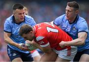 12 May 2024; Eoin Murchan, left, and John Small tackle Sam Mulroy of Louth during the Leinster GAA Football Senior Championship final match between Dublin and Louth at Croke Park in Dublin. Photo by Shauna Clinton/Sportsfile