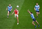 12 May 2024; Conor Grimes of Louth attempts to kick a point under pressure from James McCarthy of Dublin during the Leinster GAA Football Senior Championship final match between Dublin and Louth at Croke Park in Dublin. Photo by Harry Murphy/Sportsfile