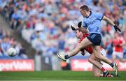 12 May 2024; Con O'Callaghan  of Dublin shoots to score his side's first goal despite the efforts of Bevan Duffy of Louth during the Leinster GAA Football Senior Championship final match between Dublin and Louth at Croke Park in Dublin. Photo by Shauna Clinton/Sportsfile