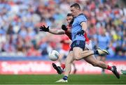 12 May 2024; Con O'Callaghan  of Dublin on his way to scoring his side's first goal despite the efforts of /Bevan Duffy of Louth during the Leinster GAA Football Senior Championship final match between Dublin and Louth at Croke Park in Dublin. Photo by Shauna Clinton/Sportsfile
