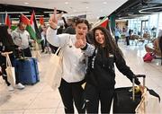 12 May 2024; Charlotte Phillips, left, and Laila Alshaikh of Palestine on arrival at Dublin Airport as the Palestine women's national football team arrive in Ireland for an International Solidarity Match against Bohemians to be played on Wednesday at Dalymount Park in Dublin. Photo by Stephen McCarthy/Sportsfile